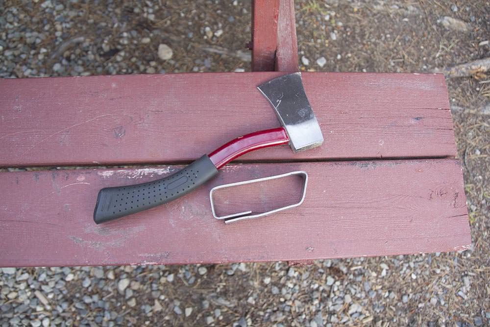 Bracket, bent using a hatchet and the grate from a fire pit.
