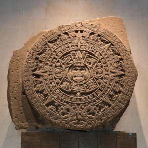 Aztec Calendar Stone/ Sun Stone. Quite a large calendar. Probably wouldn't fit behind the toilet door.