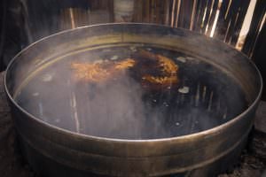 Bubbling away—A batch of wool stewing.